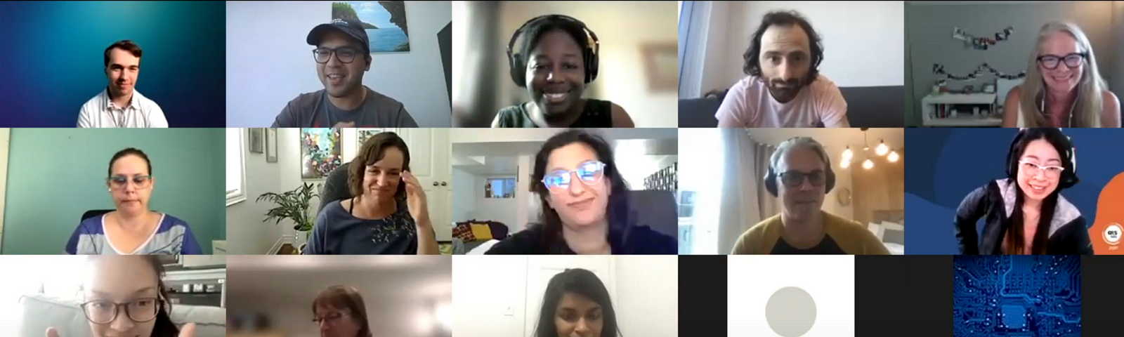 Screenshot of a Zoom call with 15 people. Everyone can be seen smiling and gesturing