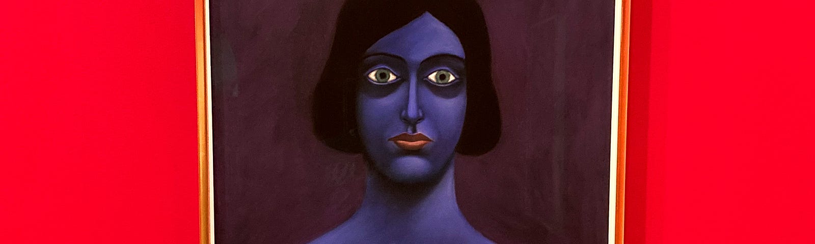 Picture of a painting of a blue-skinned woman against a bright red wall. Don’t let yourself start feeling blue without realizing it