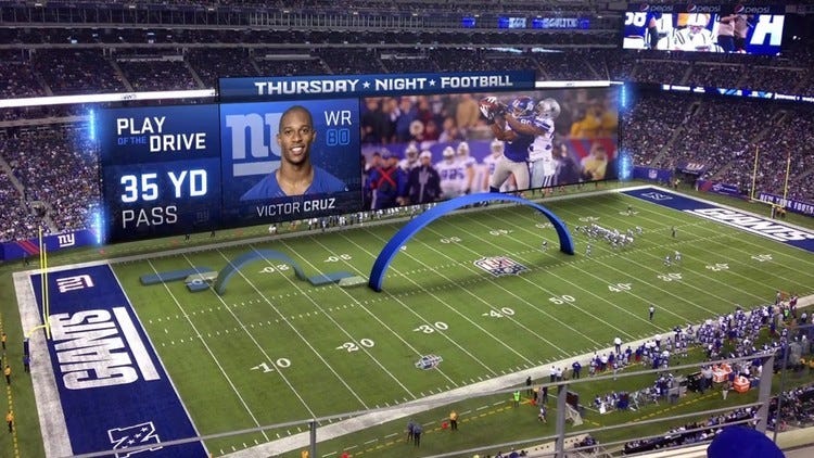 An Augmented Reality enhanced fan experience is pictured at an NFL game.