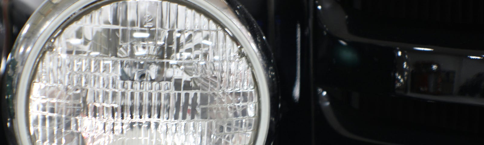 Close-up photo of truck headlamp.