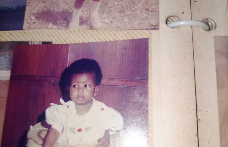 Six months old me sitting pretty and uninterested in what the world thought of my name