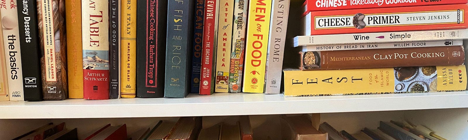 Bookshelves full of cookbooks.