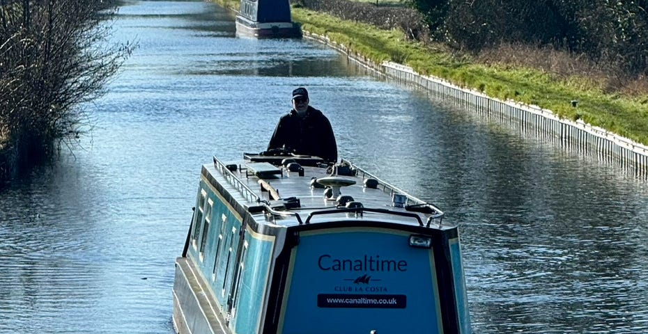 Author at the helm of the rental canal boat.