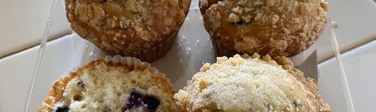 Four Blueberry Muffins.