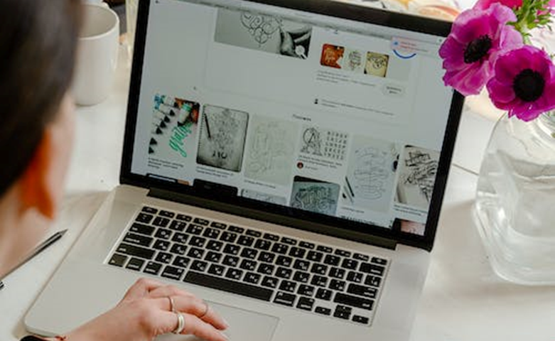 A writer sitting in front of a laptop computer writing, Antoni Shkraba, Person Using Macbook Pro on Table · Free Stock Photo (pexels.com)