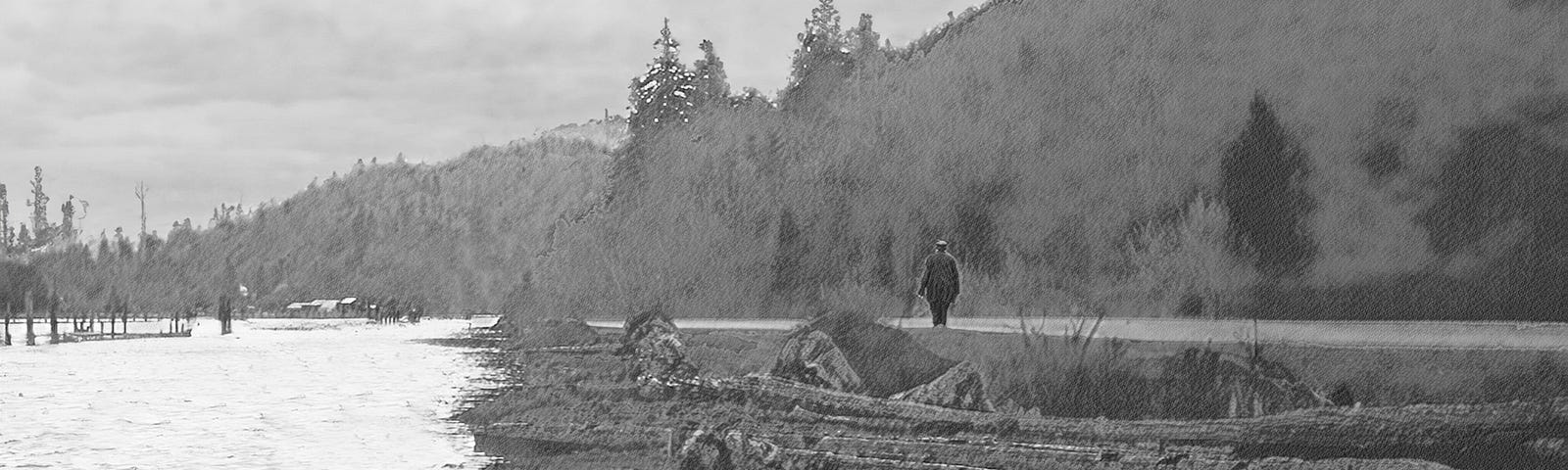 An old man walking down a road next to a tidal river, with old logs scattered on the shoreline.