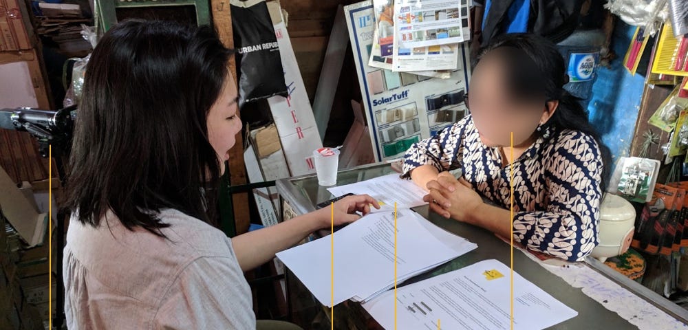 A researcher is conducting study to a participant. Some items in the image are marked with letters from A to E.