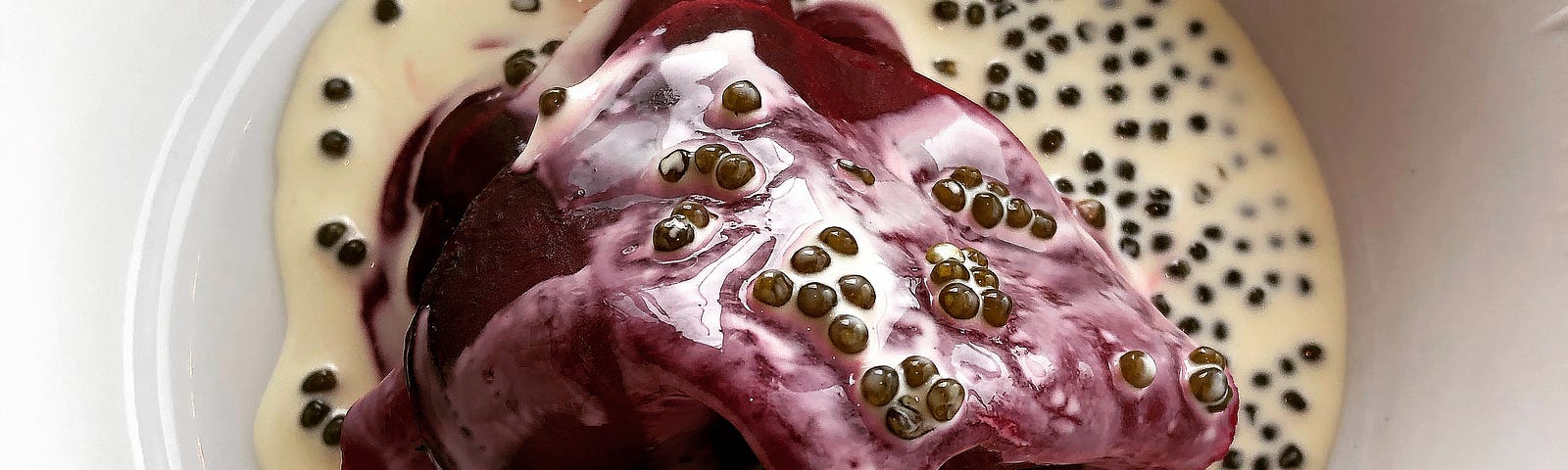 Salt-crusted red beetroot from the garden with caviar cream