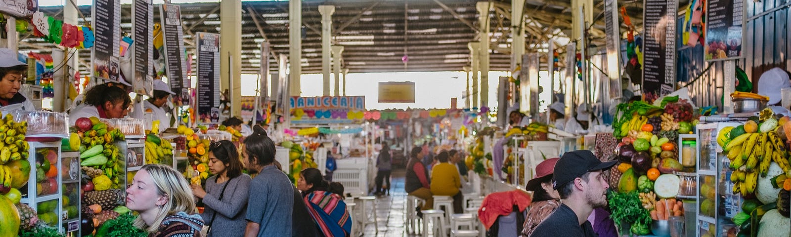 A market scene somewhere Spanish-speaking. Too bad the gringos are in the foreground.