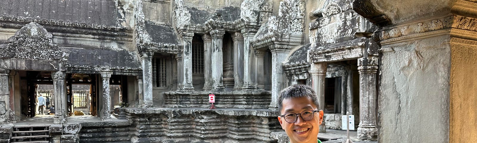 That is me taking a photo inside Angkor Wat temple