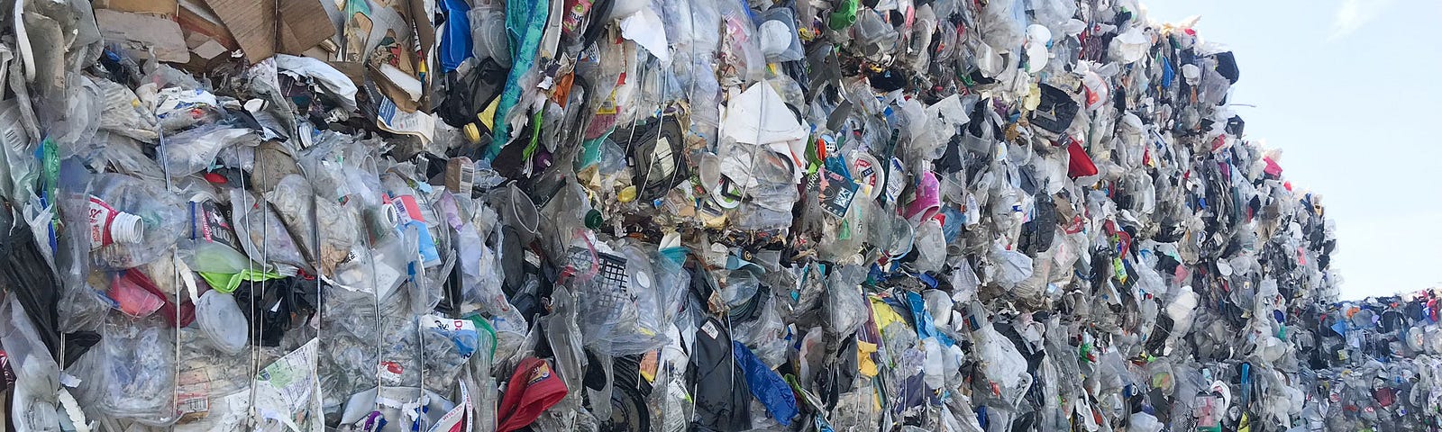 Hundreds of bundles of unwanted used plastic sits outside a recycling facility in Oregon.