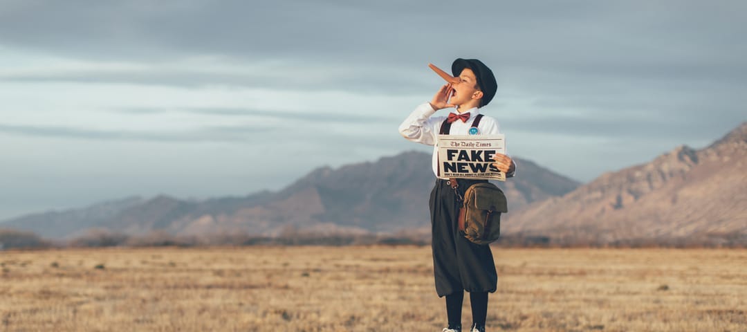 Boy shouting out about fake news