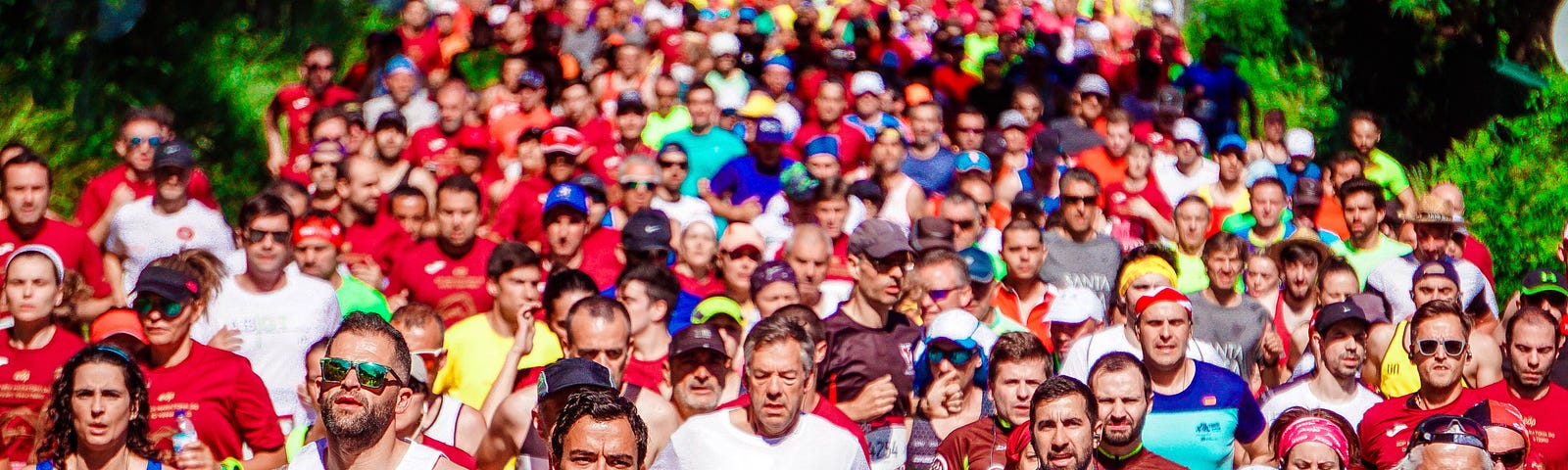 https://www.pexels.com/photo/crowd-of-male-and-female-runners-2402738/