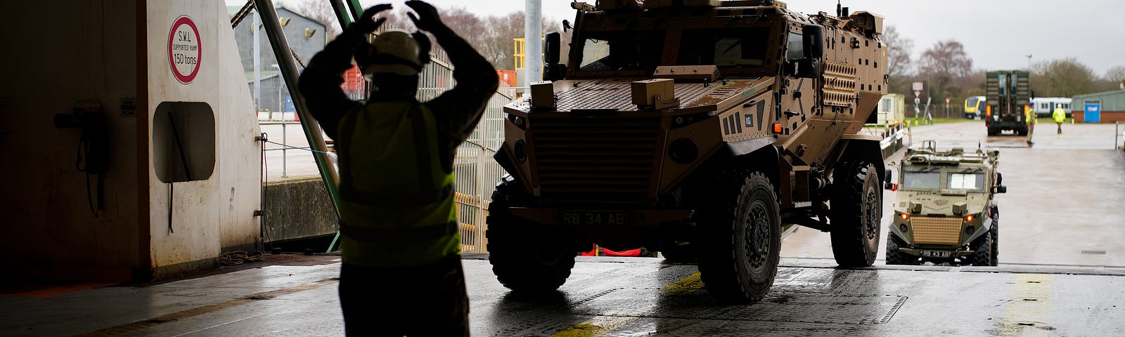 Vehicles and equipment are loaded onboard MV Anvil Point at the Sea Mounting Centre in Marchwood near Southampton, UK, February 13, 2024.  Photo by Ben Birchall/Reuters