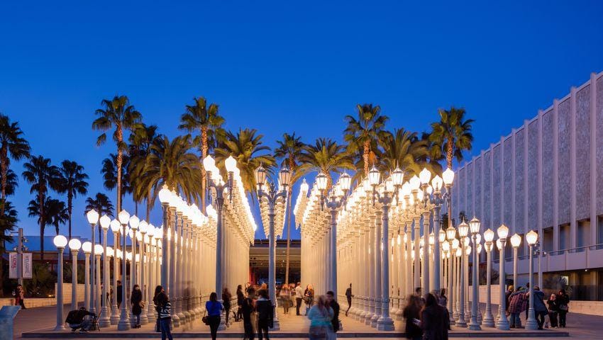 Cover for the Best Art Museums in Los Angeles, California featuring LACMA’s “Urban Lights” outdoor exhibit.