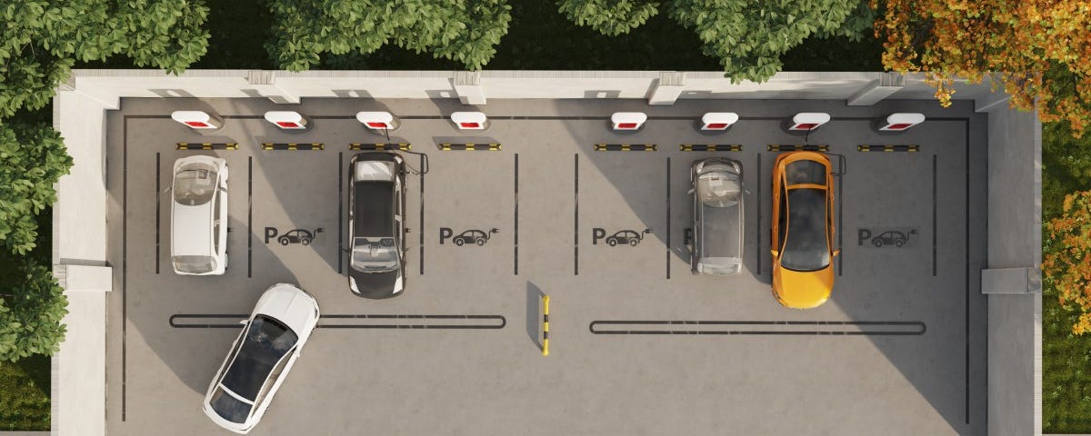 A bird’s eye view image of electric cars parked and looking for parking with Parknav