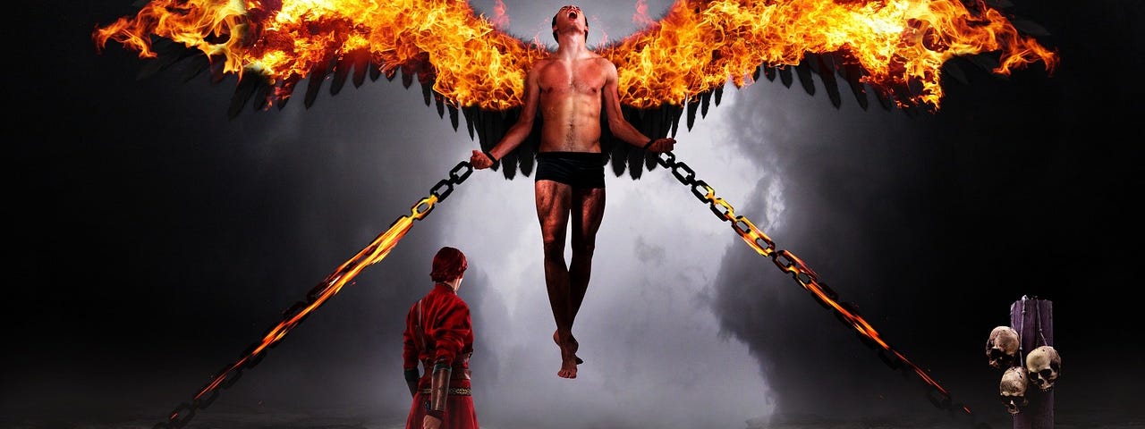The rising of a fallen angel in his fiery glory, breaking his shackled chains.