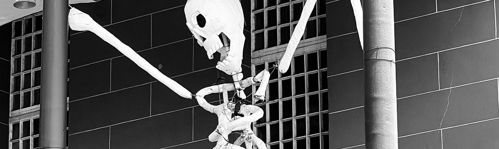 Skeleton dancing on balcony.