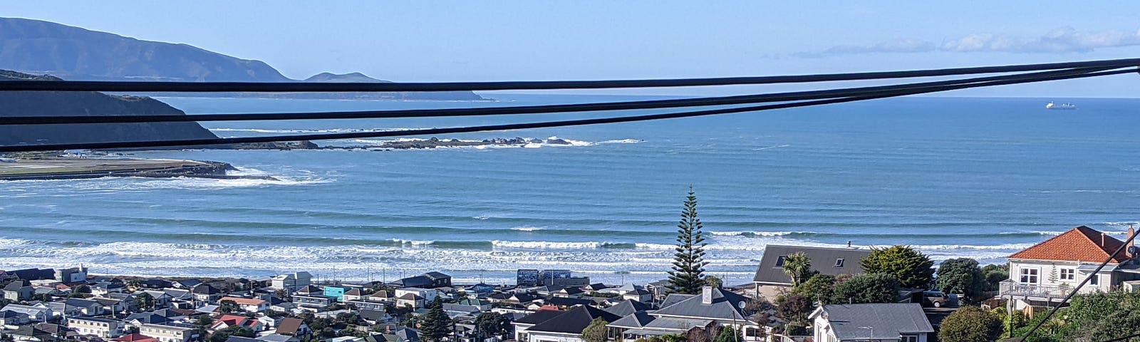 Picture of Lyall Bay, Wellington. Beautiful day and good waves coming in.