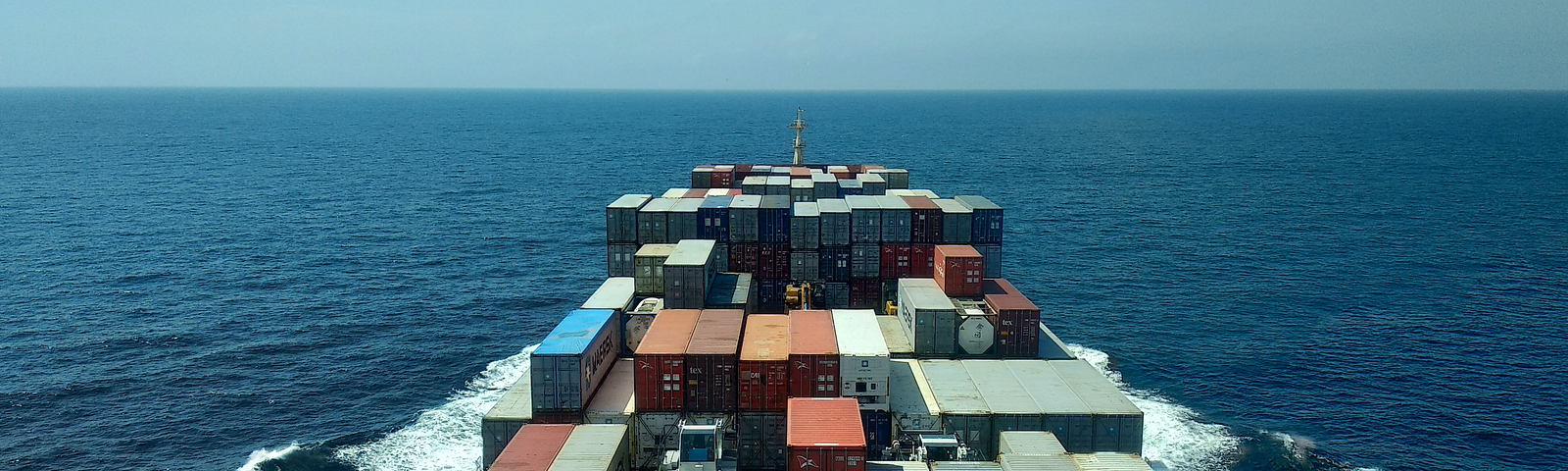 Picture of a container ship sailing on sea