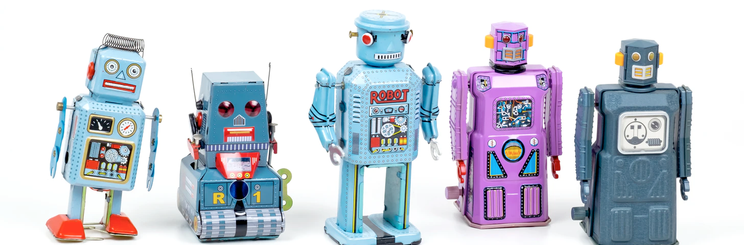 Little toy robots, collection of blue and pink colored