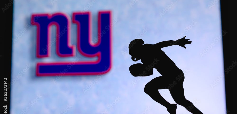 New York Giants silhouette of a running back. Logo of NYG in background.