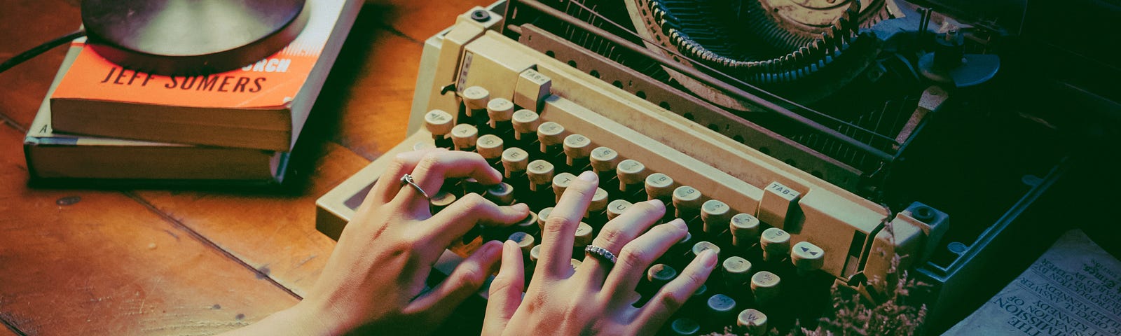 Person using typewriter