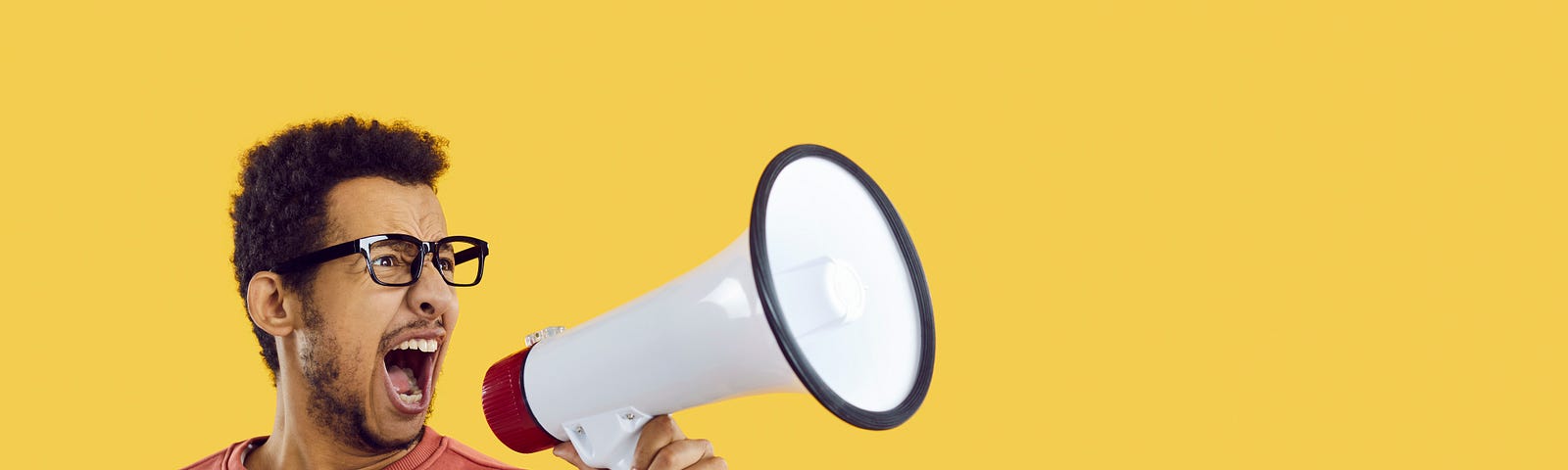 Man shouting in megaphone.