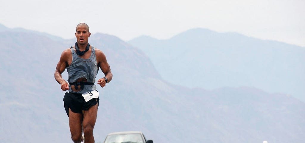 David Goggins running in an ultra-marathon.