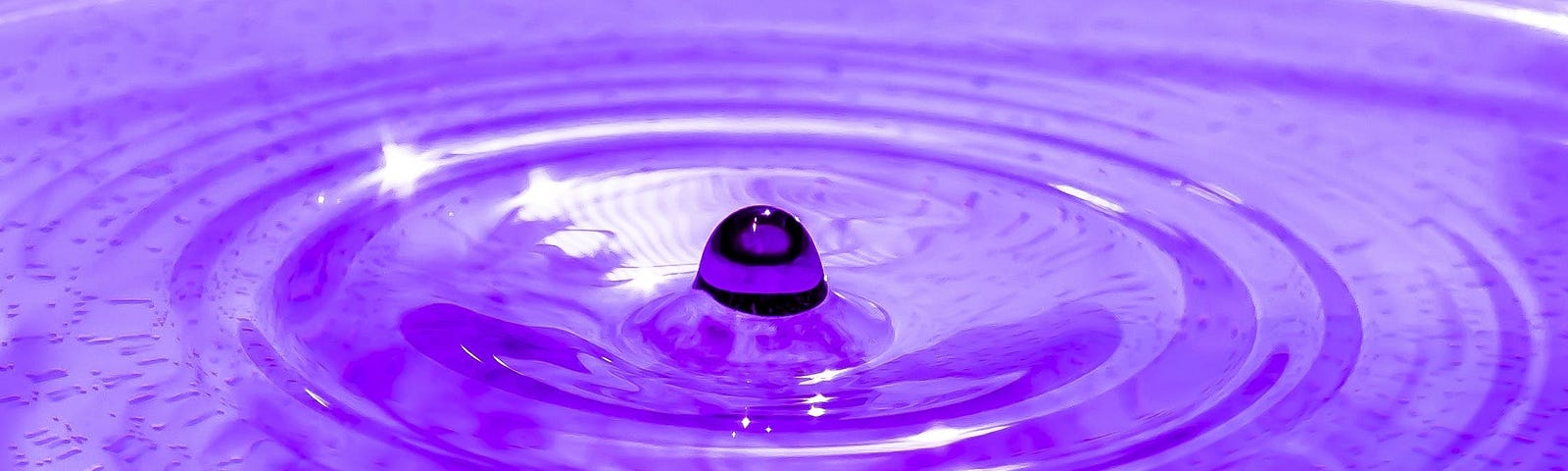 Purple ripples in water