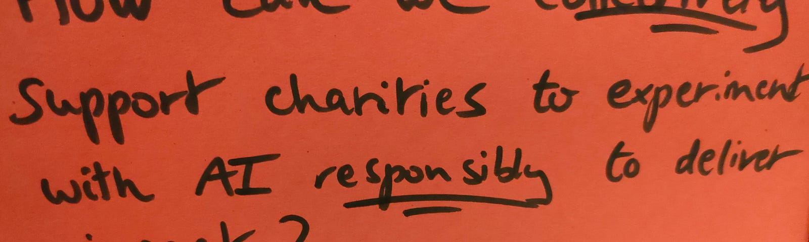 A post-it with the question “how can we collectively support charities to experiment with AI responsibly to deliver impact? Opportunities and gaps? Who’s providing support? Signed: David, CAST