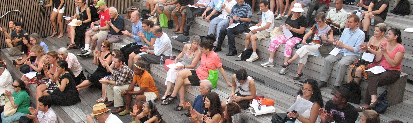 Audience members at a performance of The Protest Club/El Club de Protesta, led by Pablo Helguera, June 2011