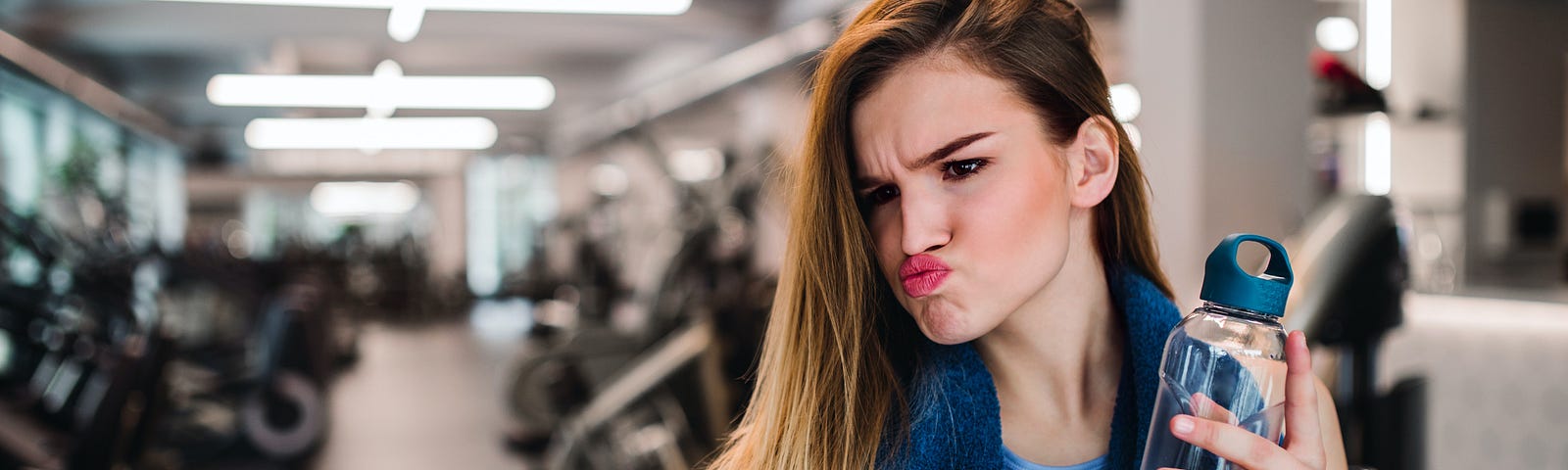 Woman crossly pouting lips at camera