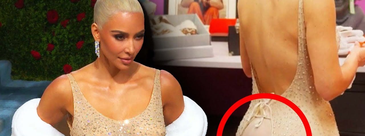 Kardashian wearing Monroe’s dress, which did not fit her from behind! Credits: Inside Edition YouTube Channel