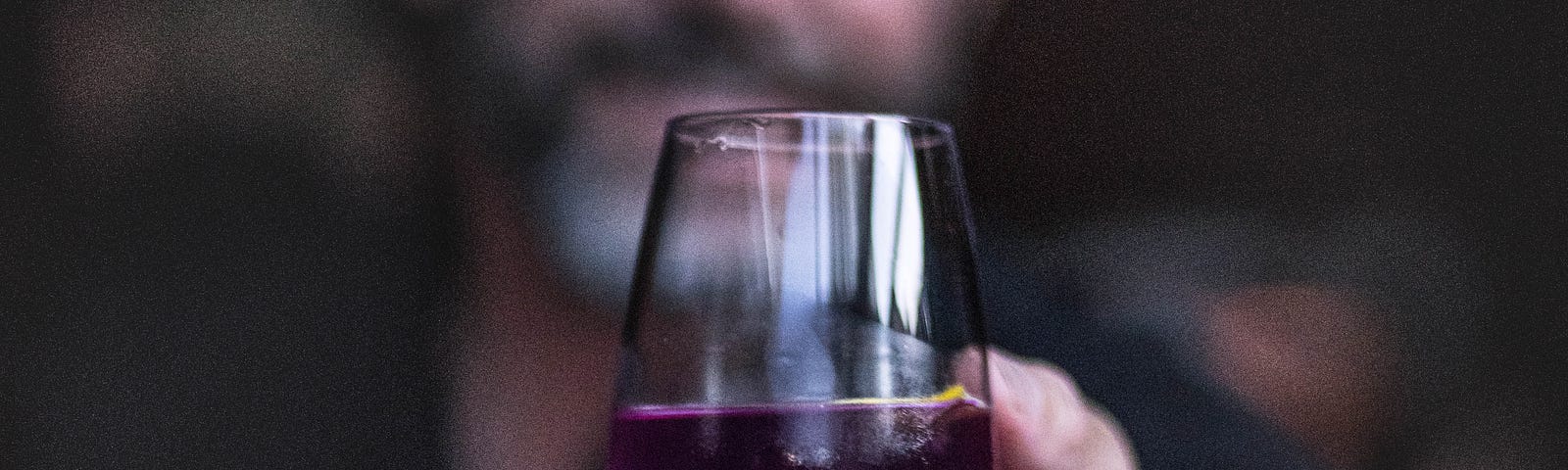 A tainted glass of wine is offered by a creepy bartender.