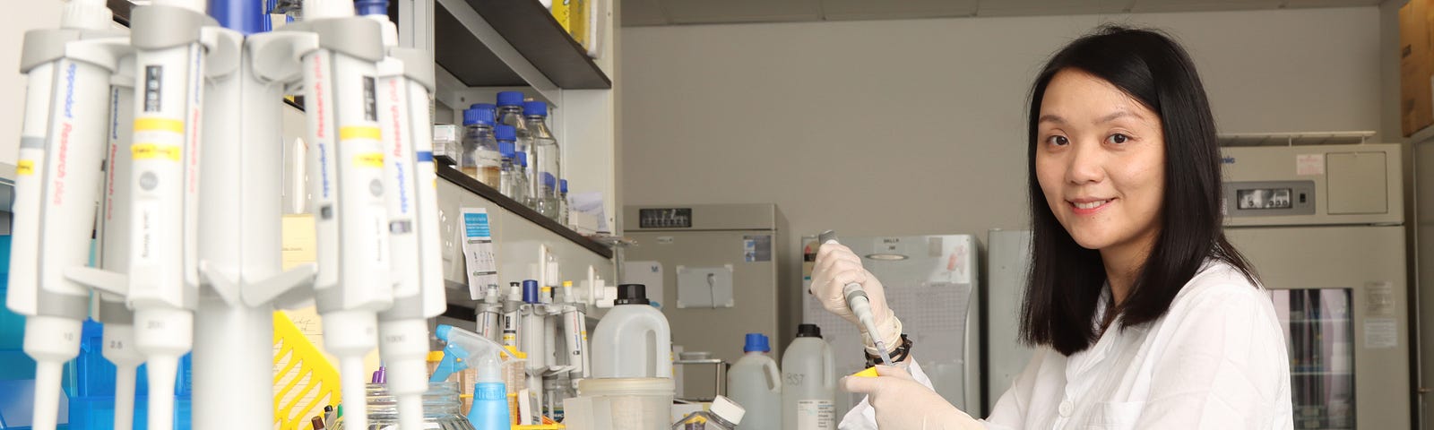 Dr. Carmen Wong working at the HKUMed research lab