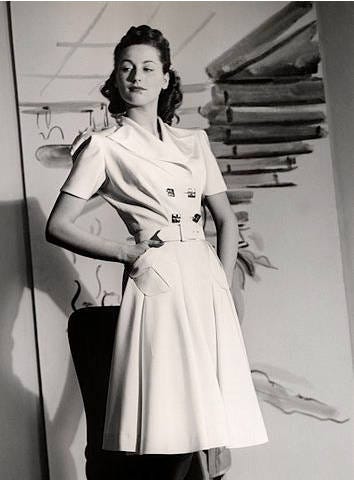 Woman dressed in 1940–50s fashion, model photographed by unknown photographer. https://creativecommons.org/licenses/by/4.0/legalcode