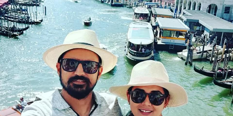 Author and her husband on Rialto Bridge in Venice. Credits: Author’s own image