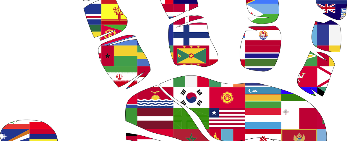 IMAGE: All the flags of the countries in the world filling the shape of an open hand