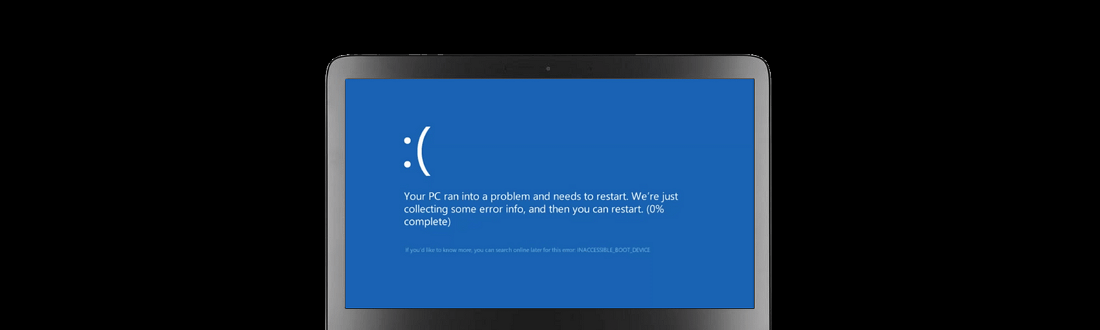 Blue Screen of Death shown on the laptop screen on a black background