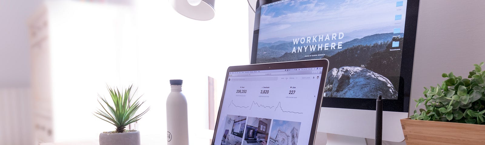 A MacBook and an iMac on a desk