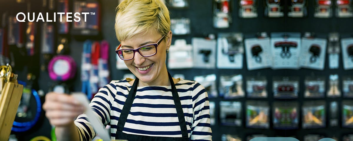 Woman using Point of Sale (PoS) system