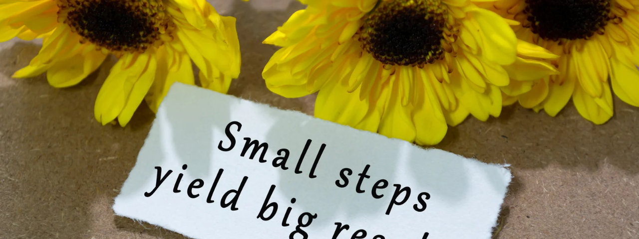 Image of sunflowers with a note that says small steps yield big results.