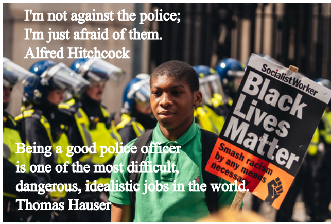 Protester in front of police “Black Lives Matter