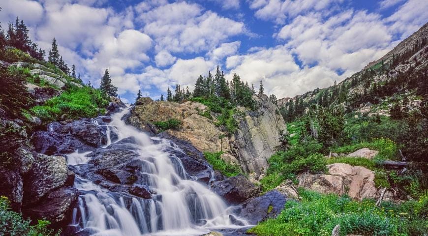 John Fielder photograph of mountain waterfall in Colorado