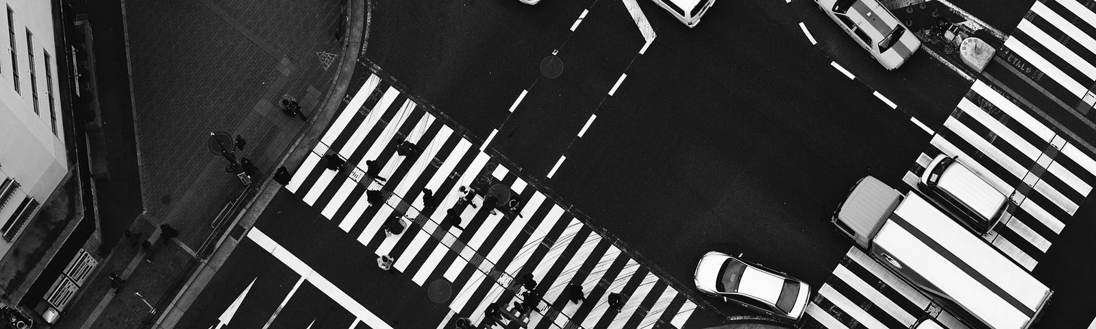 black and white overhead photo of a busy city intersection