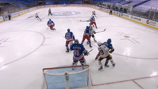 Igor Shesterkin makes a save against the Pittsburgh Penguins