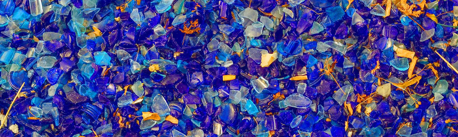 Picture of bright blue and white glass shards.