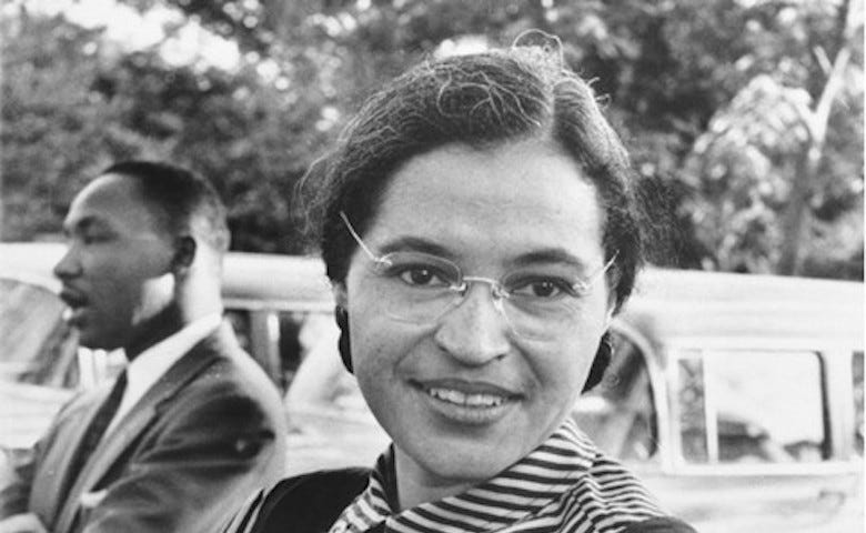 Rosa Parks in the 1950s with Martin Luther King Jr. in the background