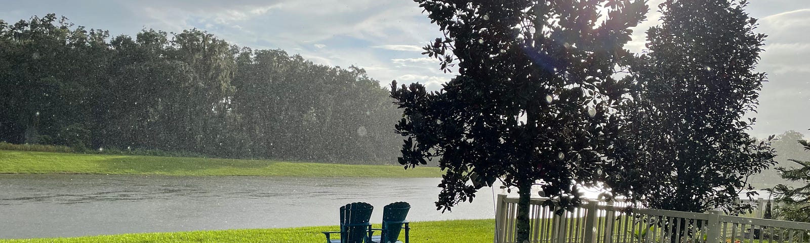 Sun Shower on Coventry Pond — Photo by Author (Robert G Metivier, 2023)